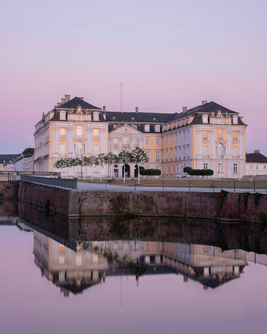 Augustusburg Castle by reflecting water