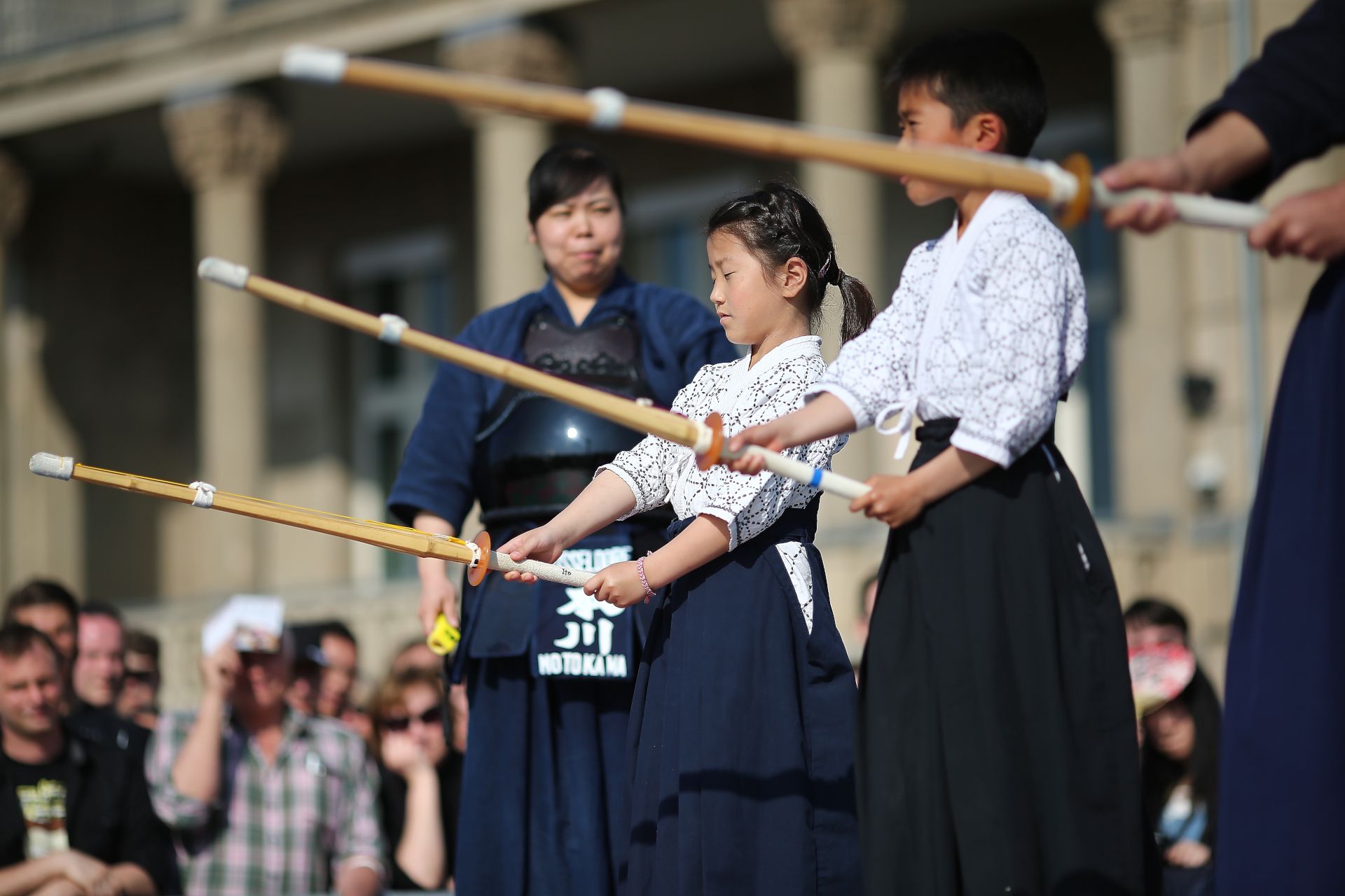 Girls and boys show off their skills in kendo, the art of Japanese sword fighting