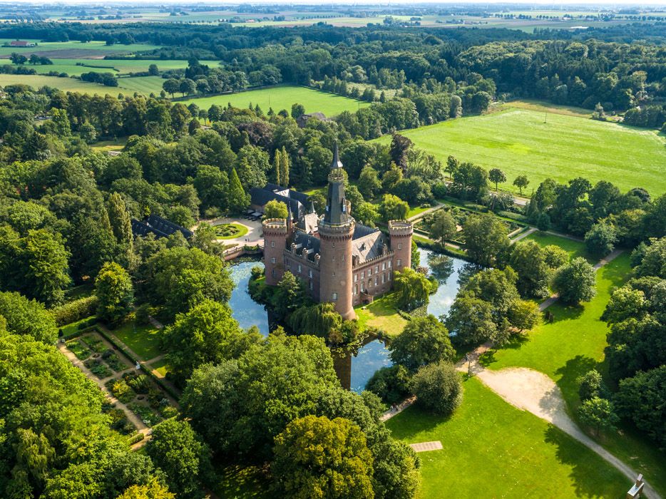 Aerial view of Schloss Moyland: the moated castle near Bedburg-Hau in the district of Kleve