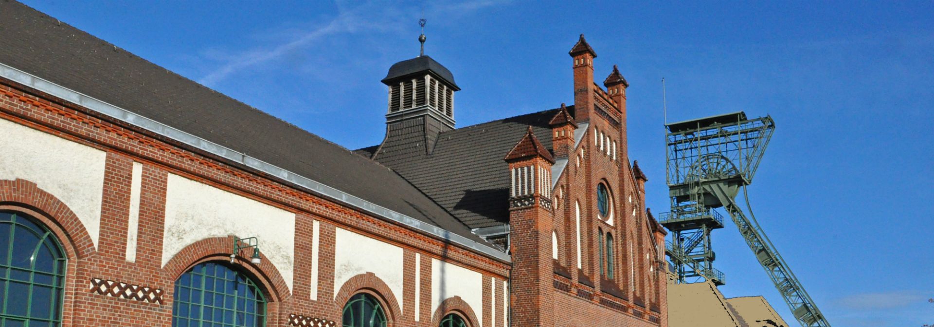 A brick façade, an Art Nouveau portal and two winding towers characterize the Zollern colliery in Dortmund