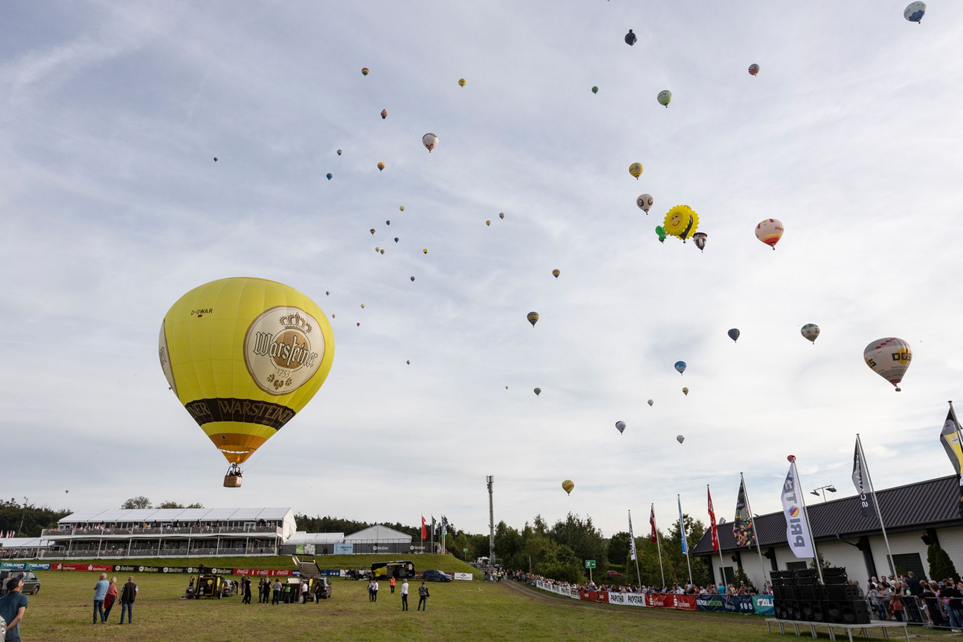 A mass balloon launch is scheduled twice a day at the Warsteiner International Montgolfiade