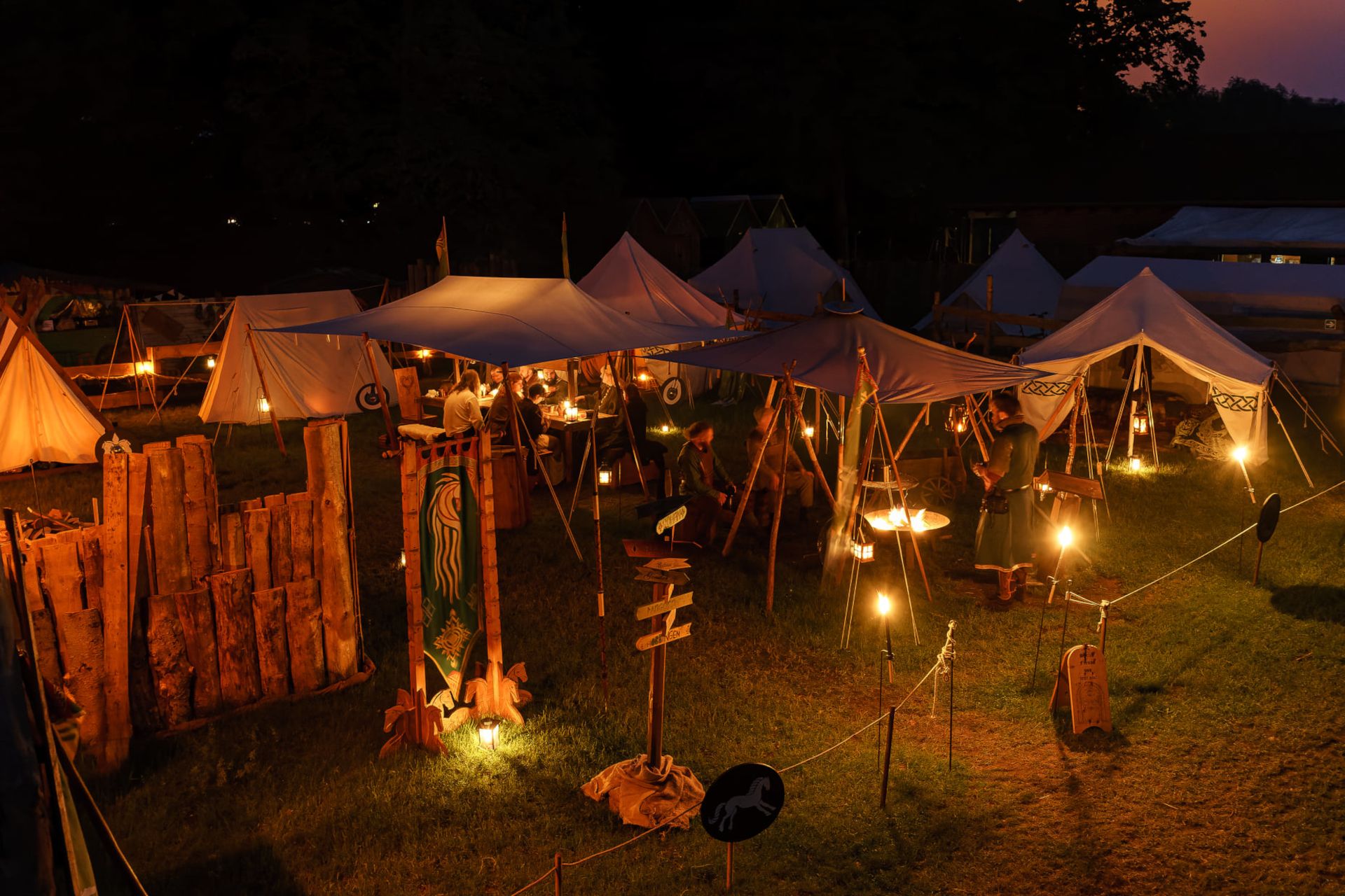 The groups of performers set up camp on the festival site