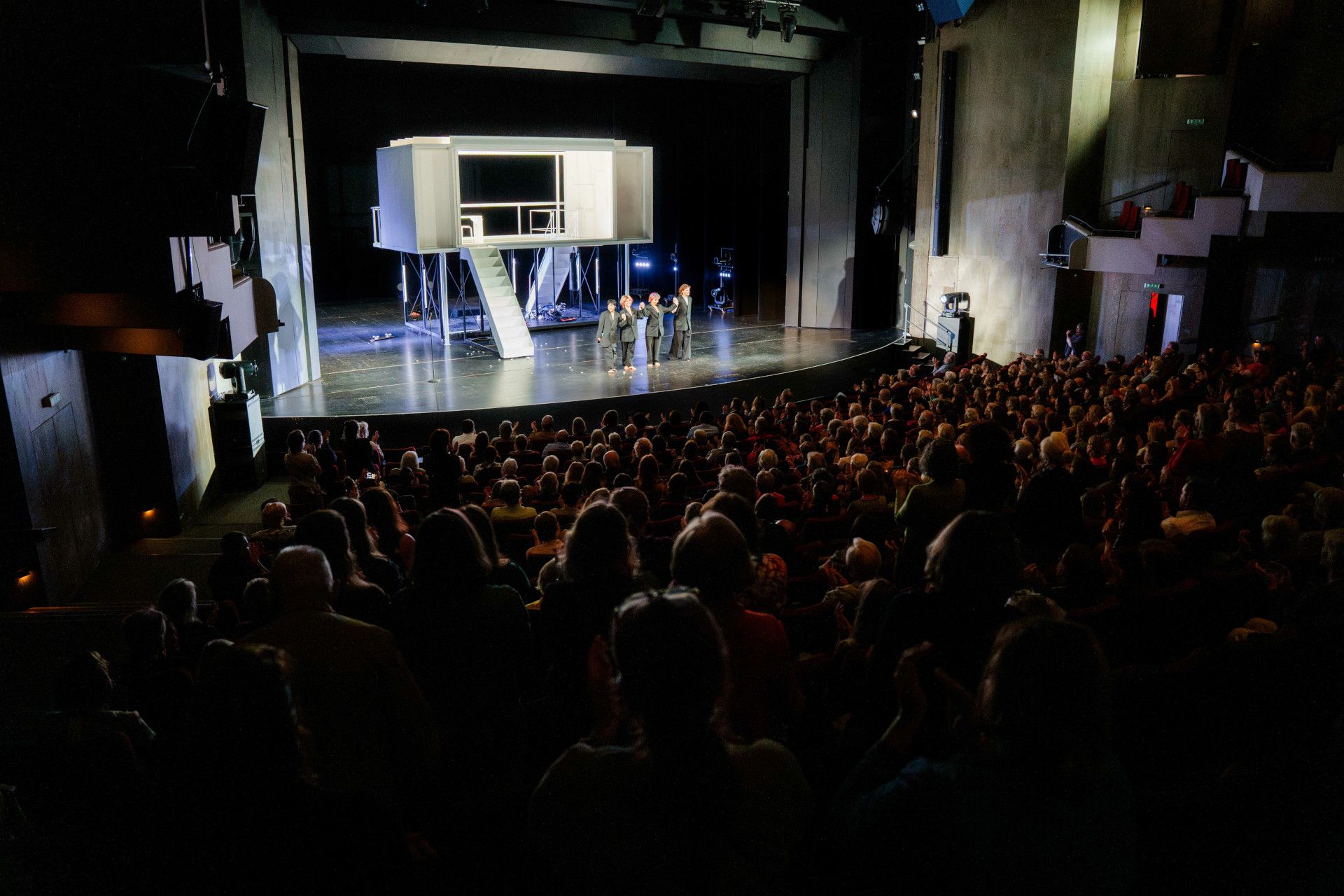 Stage with performers and audience 